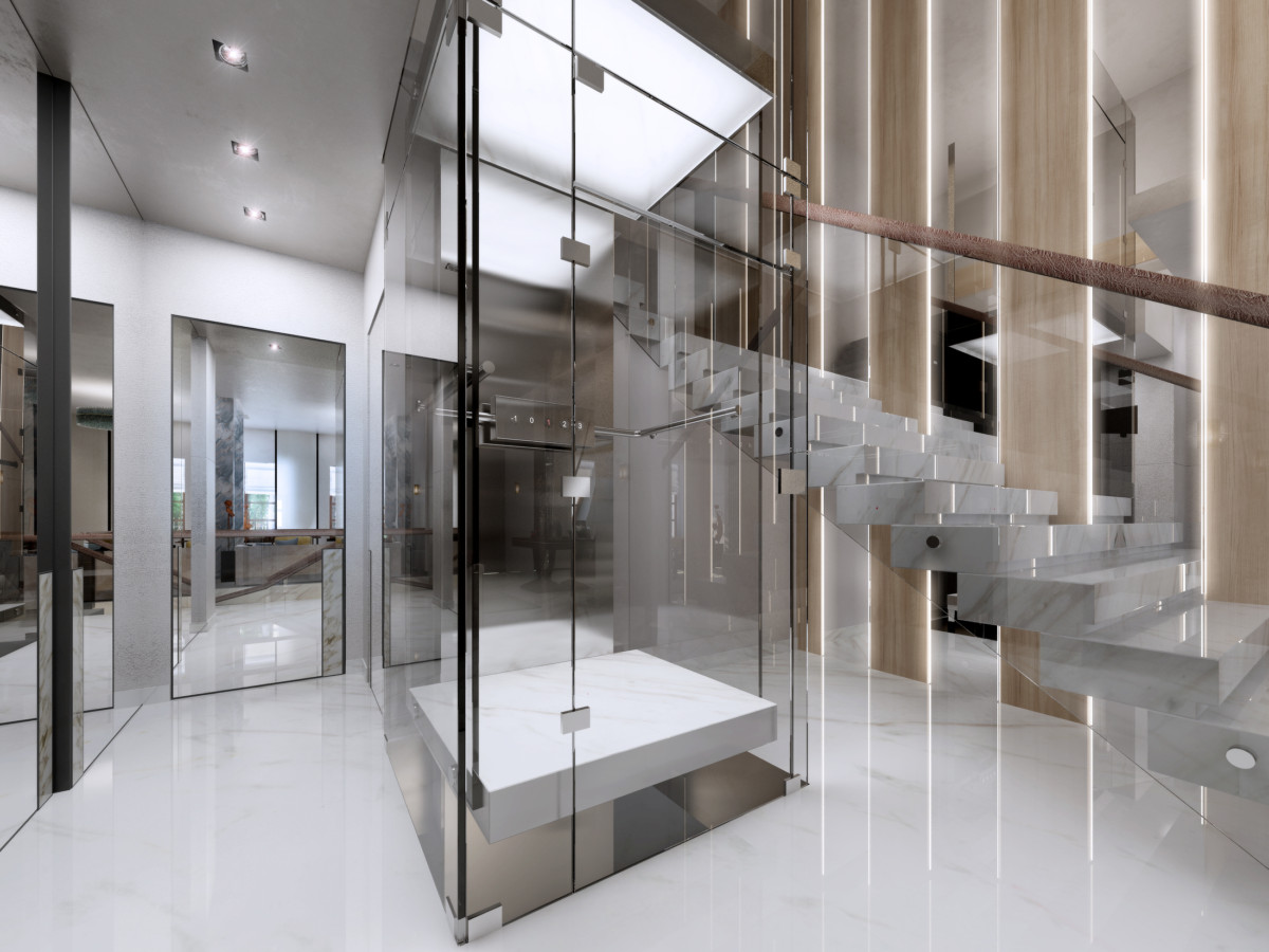 Вид на лестницу и лифт из второй гостиной на first floor. Лестница выполнена из металла, финишная отделка — мрамор. Снизу встроена светодиодная подсветка, перила из натуральной кожи.